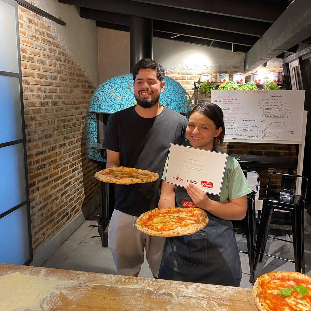 Ángel y Naty — fundadores de Heisenburguer
